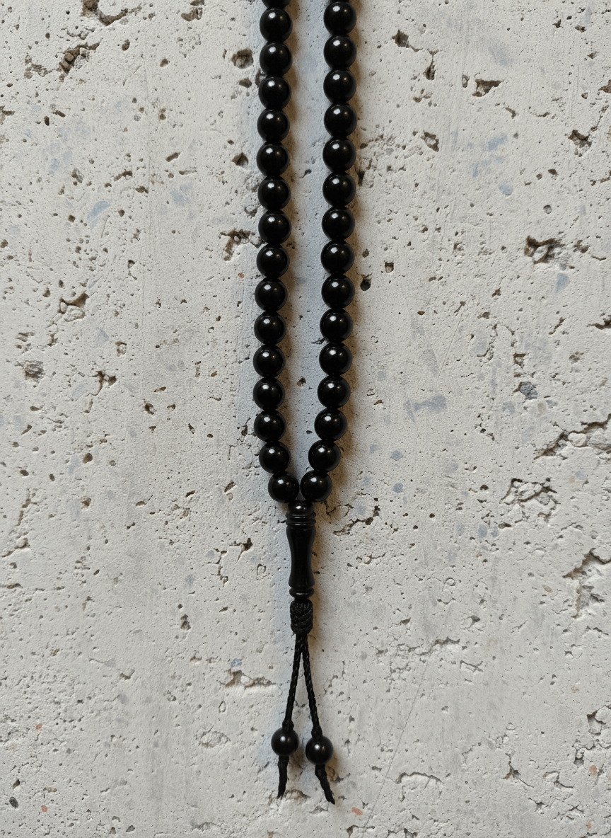 Tesbih on Textured Concrete-min